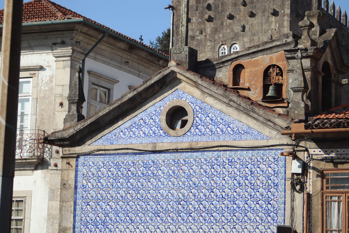 Building facade with intricate blue and white tile pattern